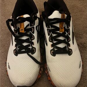 Brooks Women’s Ghost 15 White and Black Athletic Shoes with Modern Design